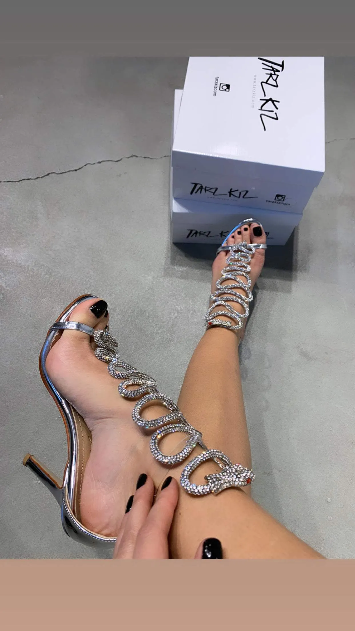 Silver sequin ribbons embellish fashionable high heels